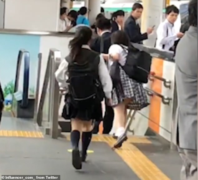 groped Asian train girl on